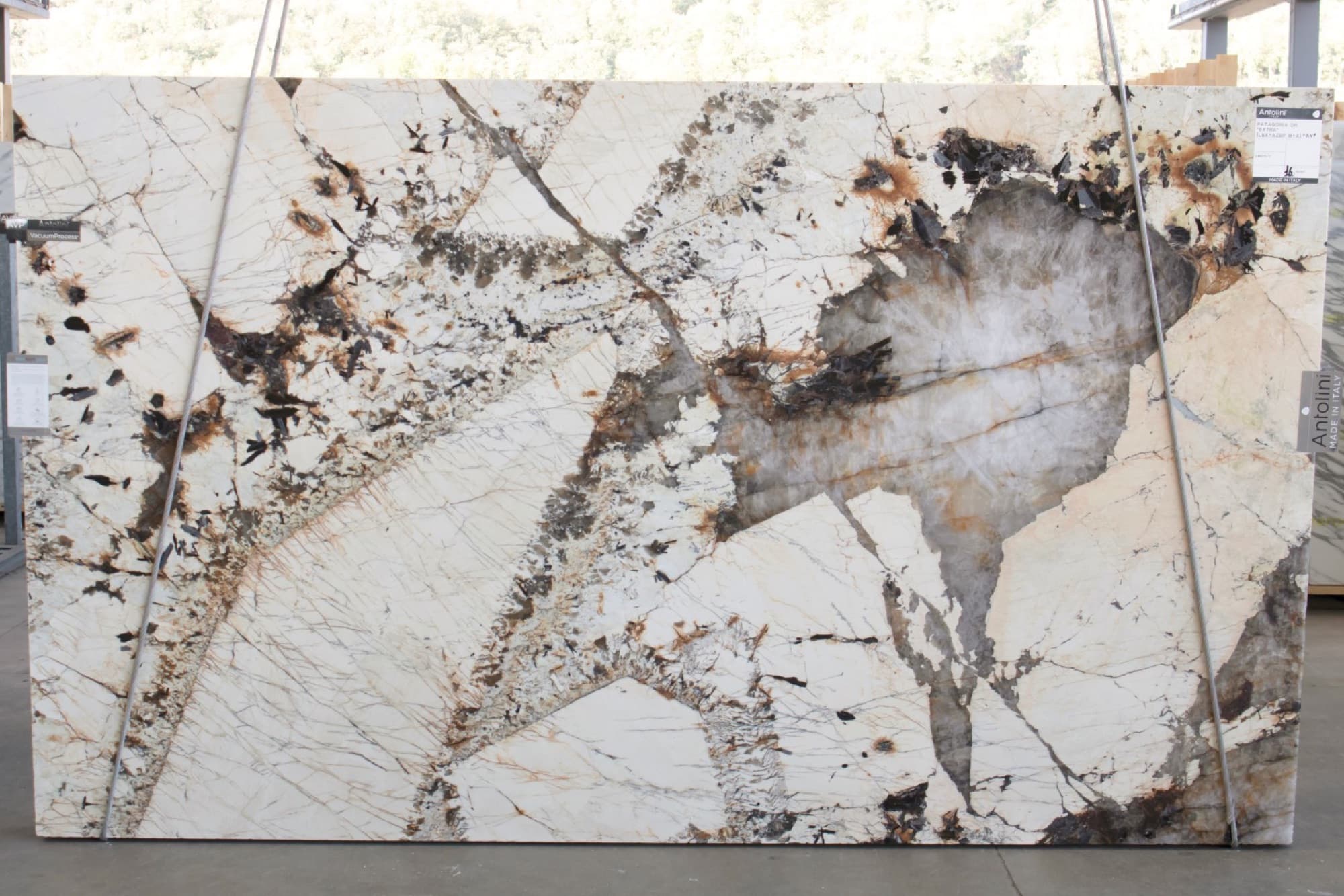 Archived full Patagonia slab showing a cream field with dark mineral movement